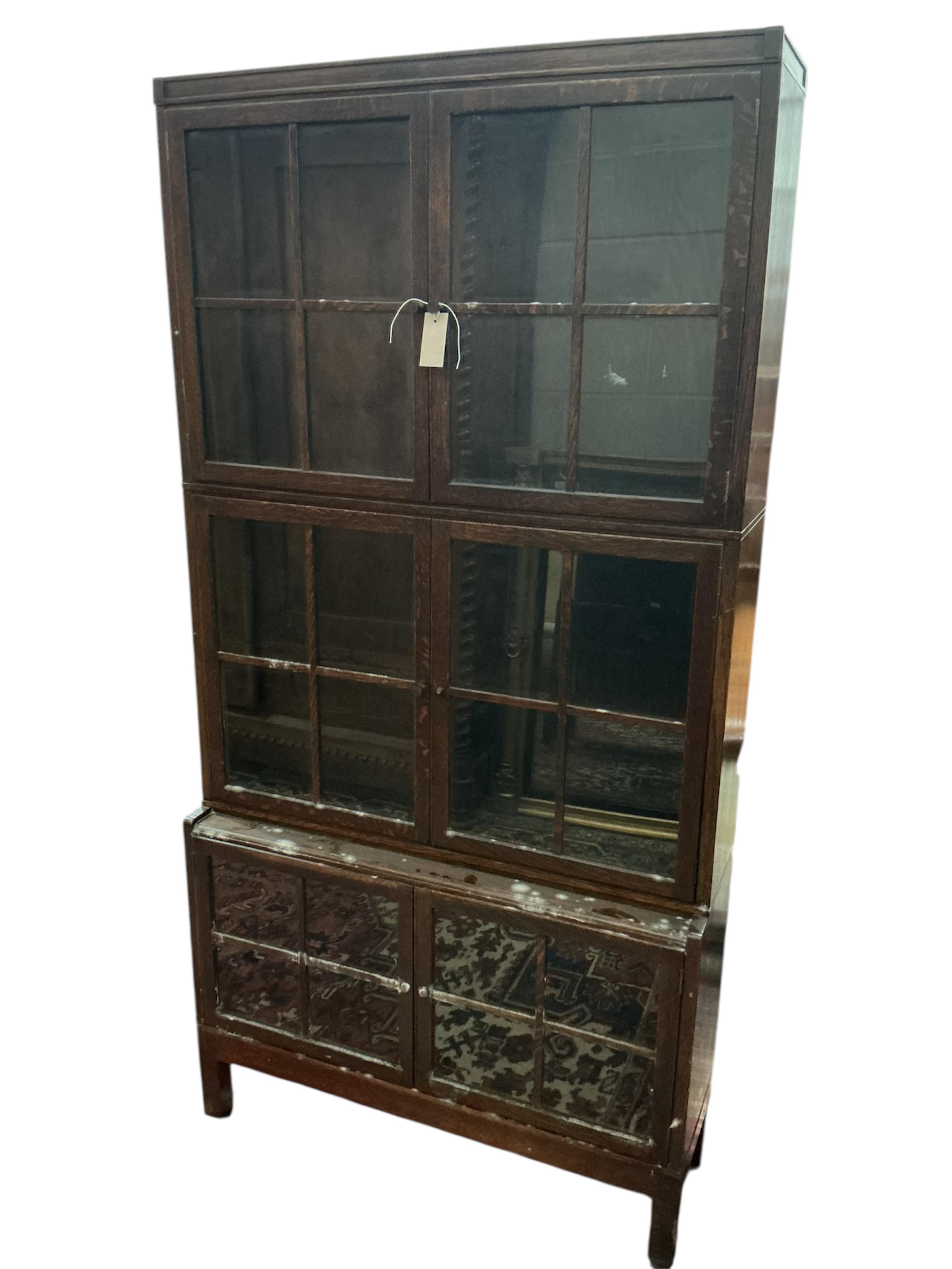 An early 20th century oak bookcase, width 88cm, depth 29cm, height 174cm